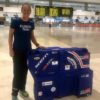 Triathlete With Her Triathlon Bike Box